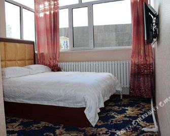 Hulunbuir Weifa Inn - Hulunbuir - Slaapkamer