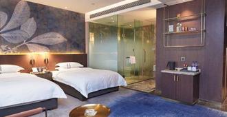 Royal International Hotel - Ürümqi - Bedroom