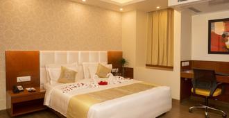 Hotel Amalfi Grand - Patna - Phòng ngủ