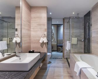 Kaili Longdu Jingyi International Hotel - Qiandongnan - Bedroom