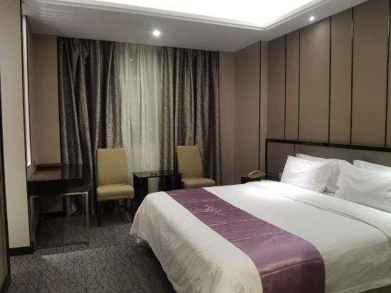 Liancheng Hotel - שנג'ן - חדר שינה