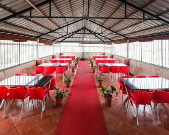 Oyo 16537 Guru Comforts - Belur - Restaurant