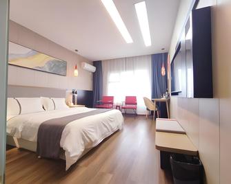 Thank Inn Hotel Sichuan Province Nanchong Branch - Nanchong - Slaapkamer