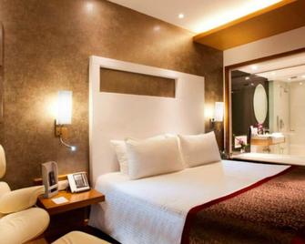 Country Inn & Suites by Radisson, Navi Mumbai - Navi Mumbai - Phòng ngủ