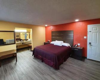Chaparral Motel - Hallettsville - Bedroom