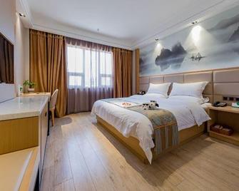 Likelai Hotel (Qingdao Licun Metro Station) - Qingdao - Bedroom