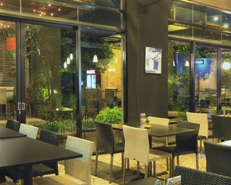 Great Escape Apartment Baros - Bandung - Restaurant