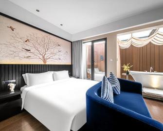Crystal Orange Hotel Nantong Gongnong Road - Nantong - Slaapkamer
