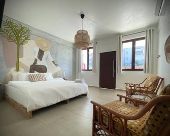Corcega Beachfront Suites - Rincon - Schlafzimmer