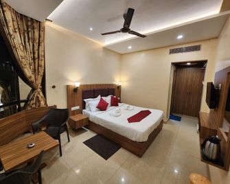Asian Inn Beach Resort - 普里 - 臥室