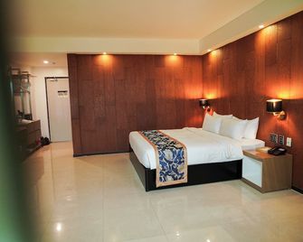 Sunday Hevea Hotel and Resort - אנג'לס סיטי - חדר שינה