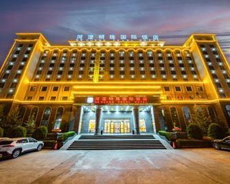 He Huang Pearl Hotel - Linxia - Building