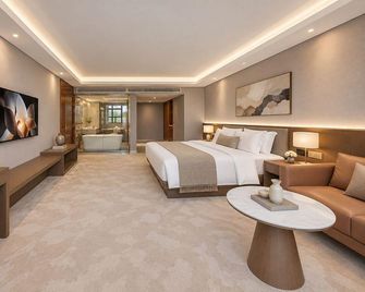 Kunming Dianchi International Hotel - Kunming - Habitación