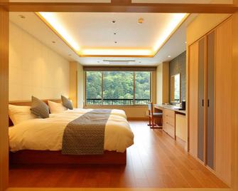 Shikanoyu Hotel - Komono - Bedroom