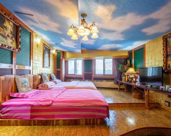 Qingdao Huake Holiday Hotel - Qingdao - Bedroom