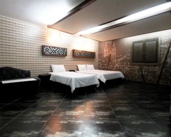 Andong Chocolate Motel - Andong - Bedroom