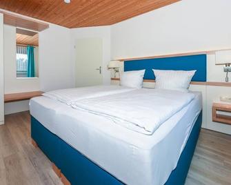 Haus Hafeneck Fewo Flut - Bensersiel - Schlafzimmer