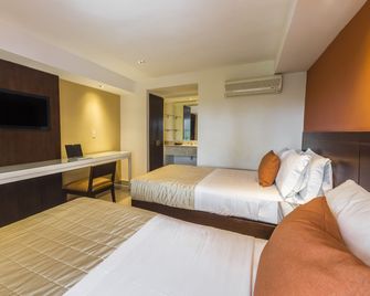 Hotel Puerta Del Sol Guadalajara - Guadalajara - Schlafzimmer