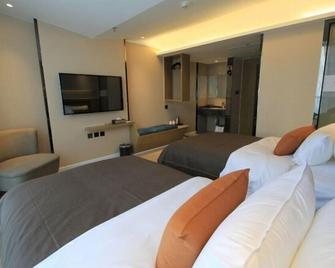 sinweier hotel - Mianyang - Bedroom