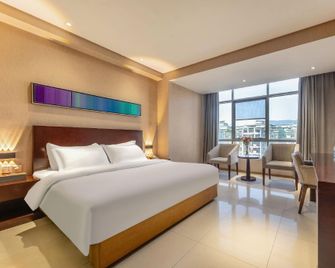 Ming Tien Inn - Wuzhou - Bedroom