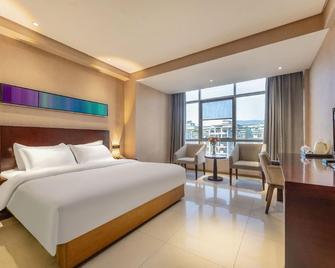 Ming Tien Inn - Wuzhou - Bedroom