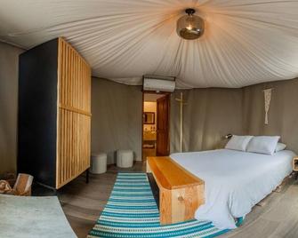 هوستال دي لا لوز - تيبوزتلان - غرفة نوم