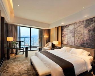 Jinlong International Hotel - Zhaoqing - Bedroom