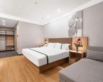 Green Tree Inn Liaoning Panjin Wanda Plaza Tianjia - Panjin - Bedroom