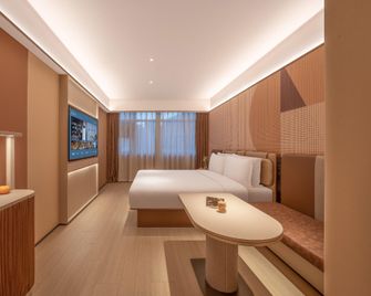 Orange Hotel Tianjin Xiaobailou - تيانجين - غرفة نوم