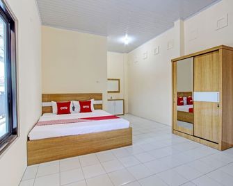 Hotel O Mi Casa Inn - Kudus - Habitación