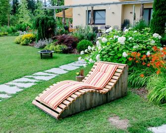 Haus am Wald Apartments with pool Child-friendly Bathing beach Faaker See - Finkenstein am Faaker See - Innenhof