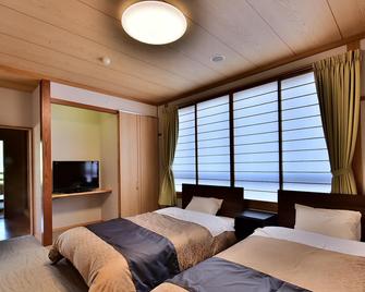 Tokura Kamiyamada Onsen Tamanoyu - Chikuma - Schlafzimmer