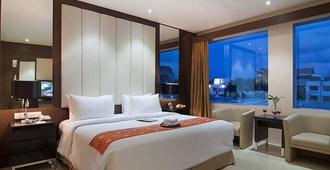 Aria Barito Hotel - Banjarmasin - Camera da letto