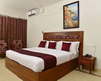OYO 6777 Star Inn - Kovalam - Habitación