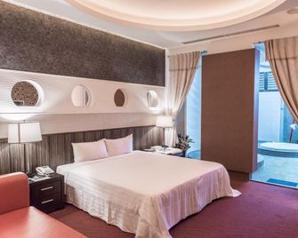 Qin Hai Motel - Mingjian Township - Habitación
