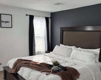 The Cozy Haven - Owasso - Schlafzimmer
