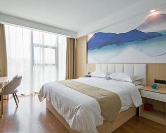Green Tree Inn Qindao Chengyang District Zhengyang Middle Road Wanda Plaza - تشينغداو - غرفة نوم