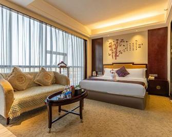 Xingsha Huatian Hotel - Changsha - Schlafzimmer