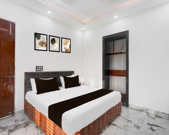 Hotel O Intro Inn - Palwal - Bedroom