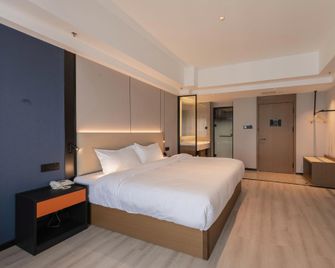 Lanyue River View Hotel (Wanda Plaza Branch) - Kuang-jüan - Ložnice