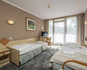 سينترم كونفرنسيجنو- ريكرياسيجني جيوفيتا - زاكوباني - غرفة نوم