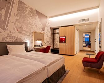 Intercityhotel Geneva - Женева - Спальня
