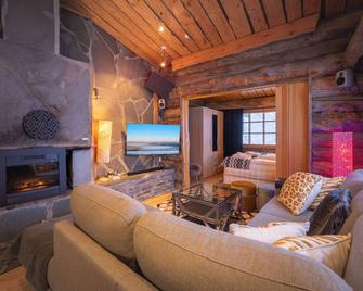Kuukkeli Log Houses Teerenpesä - Saariselka - Wohnzimmer