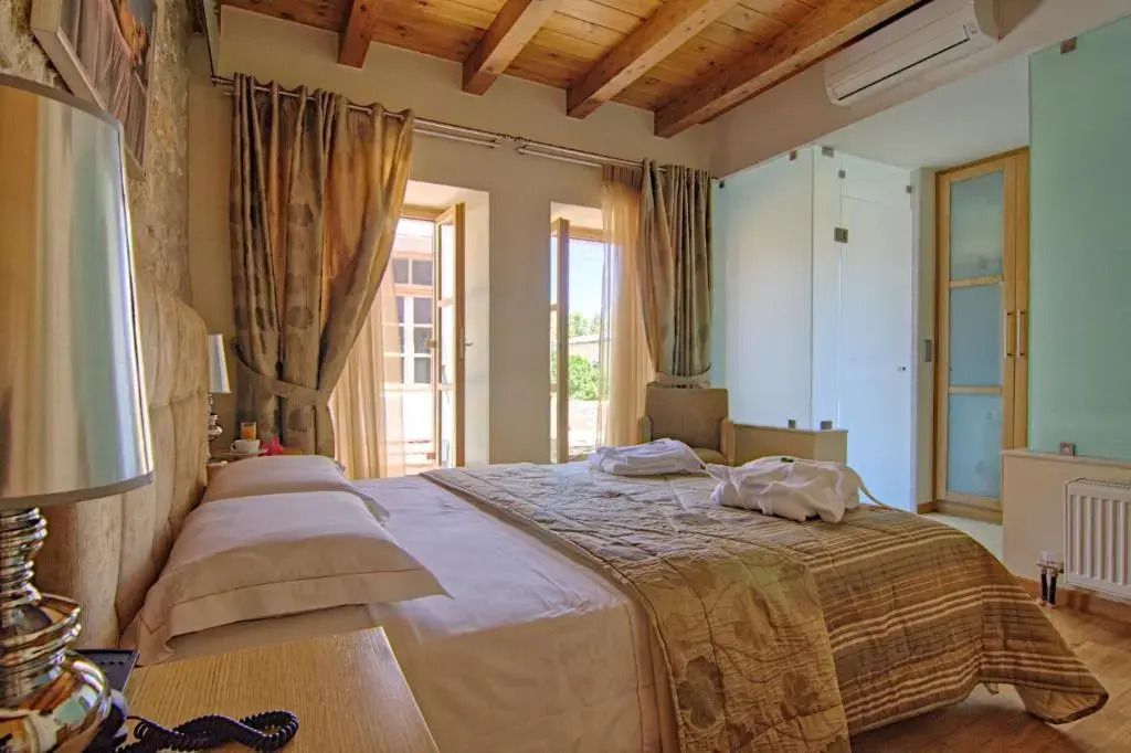 Bellagio Luxury Boutique Hotel - ריתימנו - חדר שינה