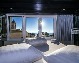Boutique Hostel Forum - זאדאר - חדר שינה