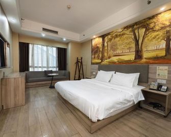 Gujing Junlai Hotel (Weiwu Square, Bozhou Municipal Government) - Bozhou - Bedroom