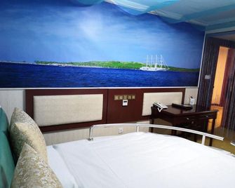Cuilinyuan Hotel - Zibo - Schlafzimmer