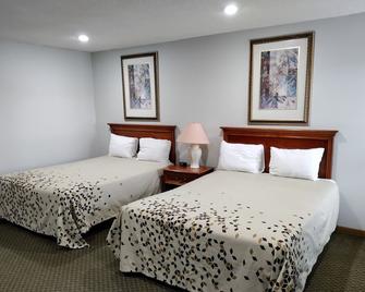 Indian Hills Inn & RV Park - Albia - Camera da letto