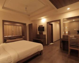 Pride Biznotel Sasan Gir - Sasan Gir - Bedroom