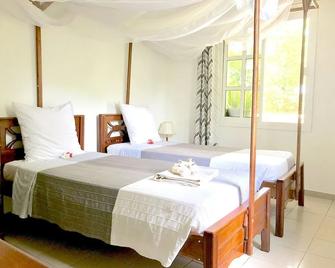 Hotel Jardin de la Paix - Moroni - Bedroom